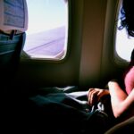 Looking out the window of an airplane. Photo by Sofia Sforza on Unsplash