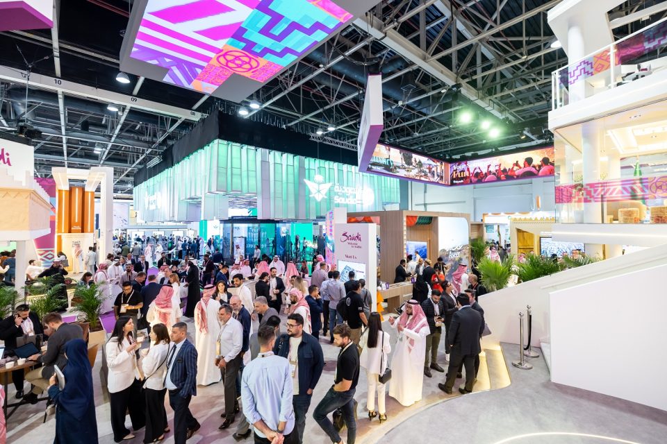 Colorful hanging fabrics in market stall