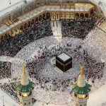 Aerial view of Kaaba and pilgrims praying in Masjid al-Haram, Mecca